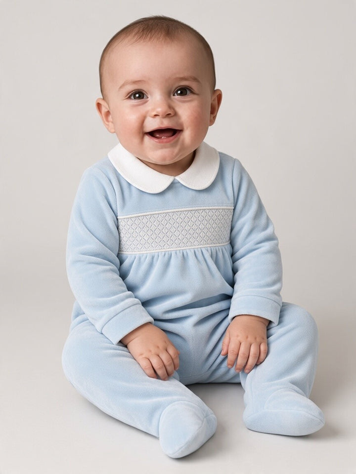Tutina in ciniglia celeste con punto smock 217 CE Jogus 