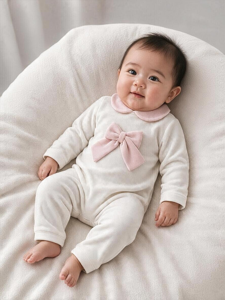 Tutina in ciniglia con fiocco rosa 218 BR Jogus 